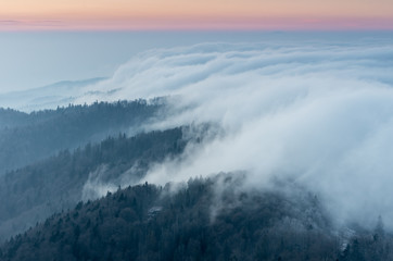 Carpathian mountains. Gorce in the clouds, seen from Luban mountain in Beskidy, Poland