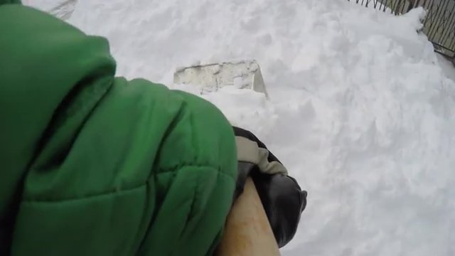 POV Man shovelling snow 