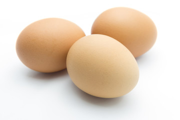 Three eggs isolated on white background
