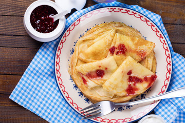 Pancakes or crepes  with raspberry jam