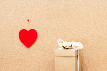 Fototapeta premium Valentine's day heart and gift box on wooden background