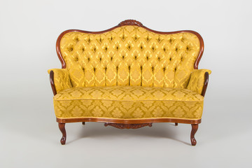Antique sofa, studio shot with shadows..Photo taken on: December 30th, 2015