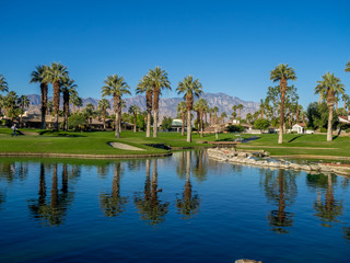 Fototapeta na wymiar Water feature on a golf course in Palm Desert.