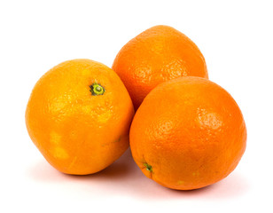 fresh yellow oranges isolated on white