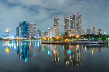 Fototapeta na wymiar Bangkok city downtown twilight with reflection of skyline,Benjak