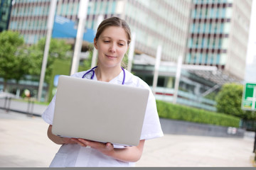 young doctor using a laptop computer