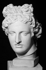 White gypseous head of a woman