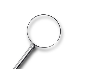 metal magnifier search on white surface