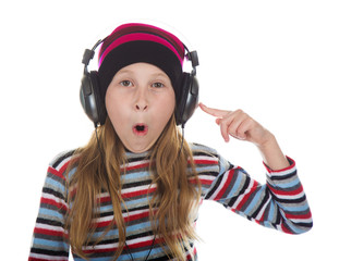Girl with headphones listening to music.