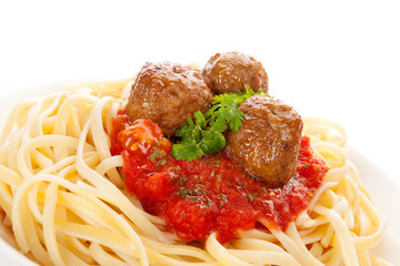 Pasta with tomato sauce and meatballs.