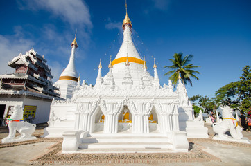 the white pagoda in a twilight at phar that doi kong moo temple,