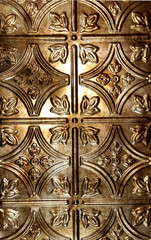 antique tin tile with bronze hue