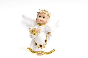 Small porcelain angel in a golden decoration