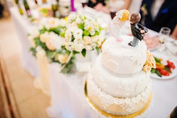 Figurines on top of wedding cake