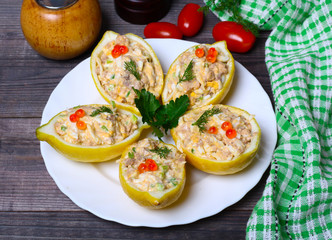 Lemon stuffed with smoked fish and cheese