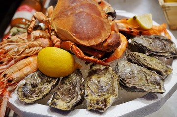 Plateau de fruits de mer (seafood platter) in a market in Brittany