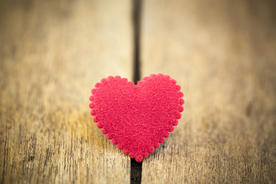 Love heart on wooden texture background, valentines day