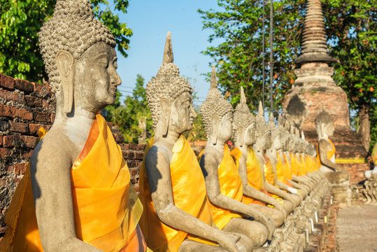 line of buddha statue image in wat yai chaimongkol , ayutthaya ,
