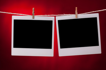 blank photo frames on red background