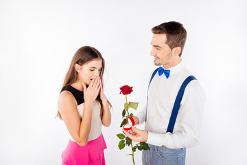 Handsome boy making  proposal for his girlfriend