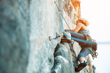 Fototapeta Rock climbing on vertical flat wall - Stock image obraz