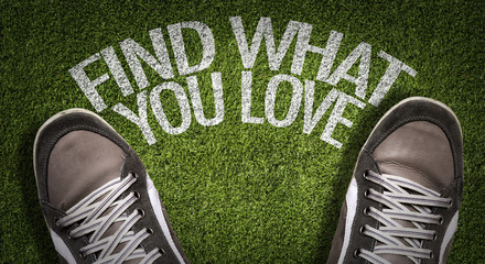 Top View of Sneakers on the grass with the text: Find What You Love