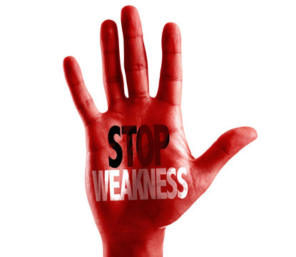 Stop Weakness written on hand isolated on white background