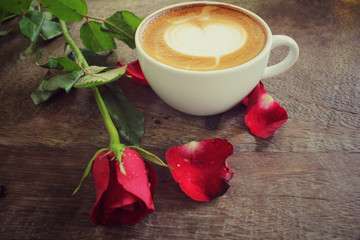 Latte art coffee with red road for valentine day