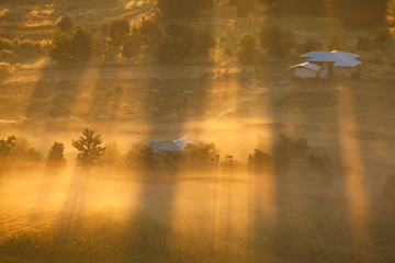 Misty morning sunrise in Khao Takhian Ngo View Point at Khao-kho