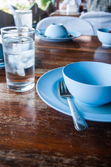 Empty Thai dish on wooden table