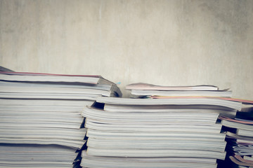magazine on table book shelf with cement mortar wall