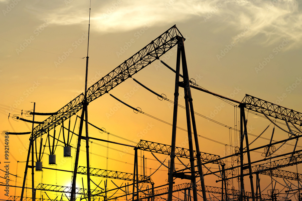 Wall mural transmission tower in the sunset