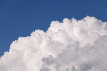 Naklejka na ściany i meble Close-up cloud with blue sky