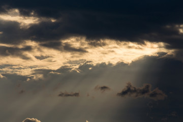 ray light of sun through cloud