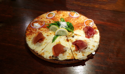 Smoke salmaon and Parma ham Pizza