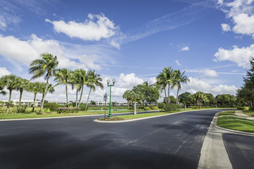 Gated community road to condominiums in tropics