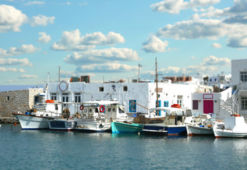 Fototapeta na wymiar Boats at the pier with tilt effect in Paros, Greece