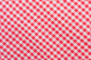 Red classic checkered tablecloth texture, background with copy s