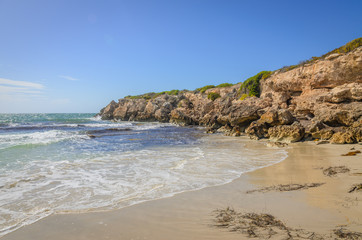 Fototapeta na wymiar Sunny day landscape coast line cliffs at the beach