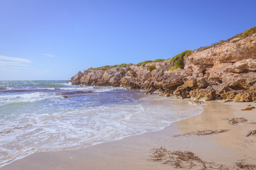 Sunny day landscape coast line cliffs at the beach