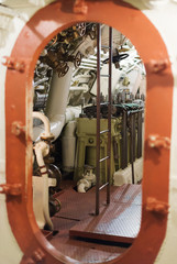 Inside of submarine. View of Diesel engine.