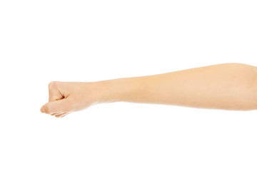 Woman hand with clenched a fist