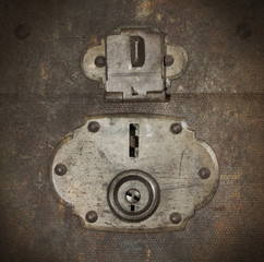 Old canvas trunk lock close up