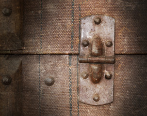 Old canvas trunk hinge close up