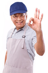smiling happy worker giving ok hand gesture
