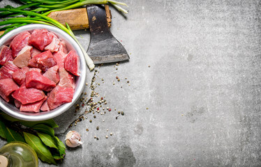 Fresh meat chopped with axe and spices.