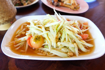 Papaya salad Thai cuisine spicy delicious with vegetables