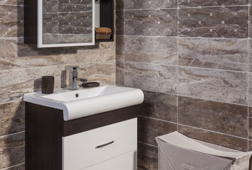 detail of fashionable bathroom - toilet and sink