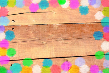Confetti on Brown Wooden Background
