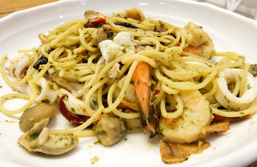 Spaghetti seafood with chili and basil
